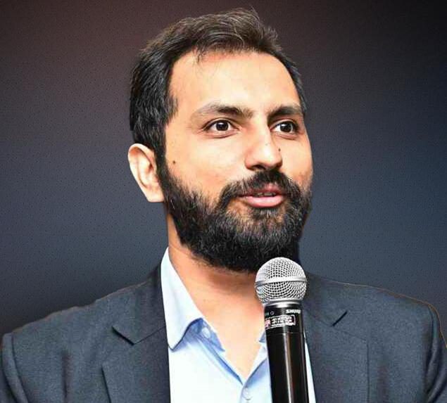 Mehul Thakkar speaking at a training session